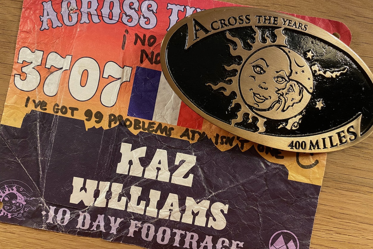 Across the Years race number and finishers 400 mile buckle.