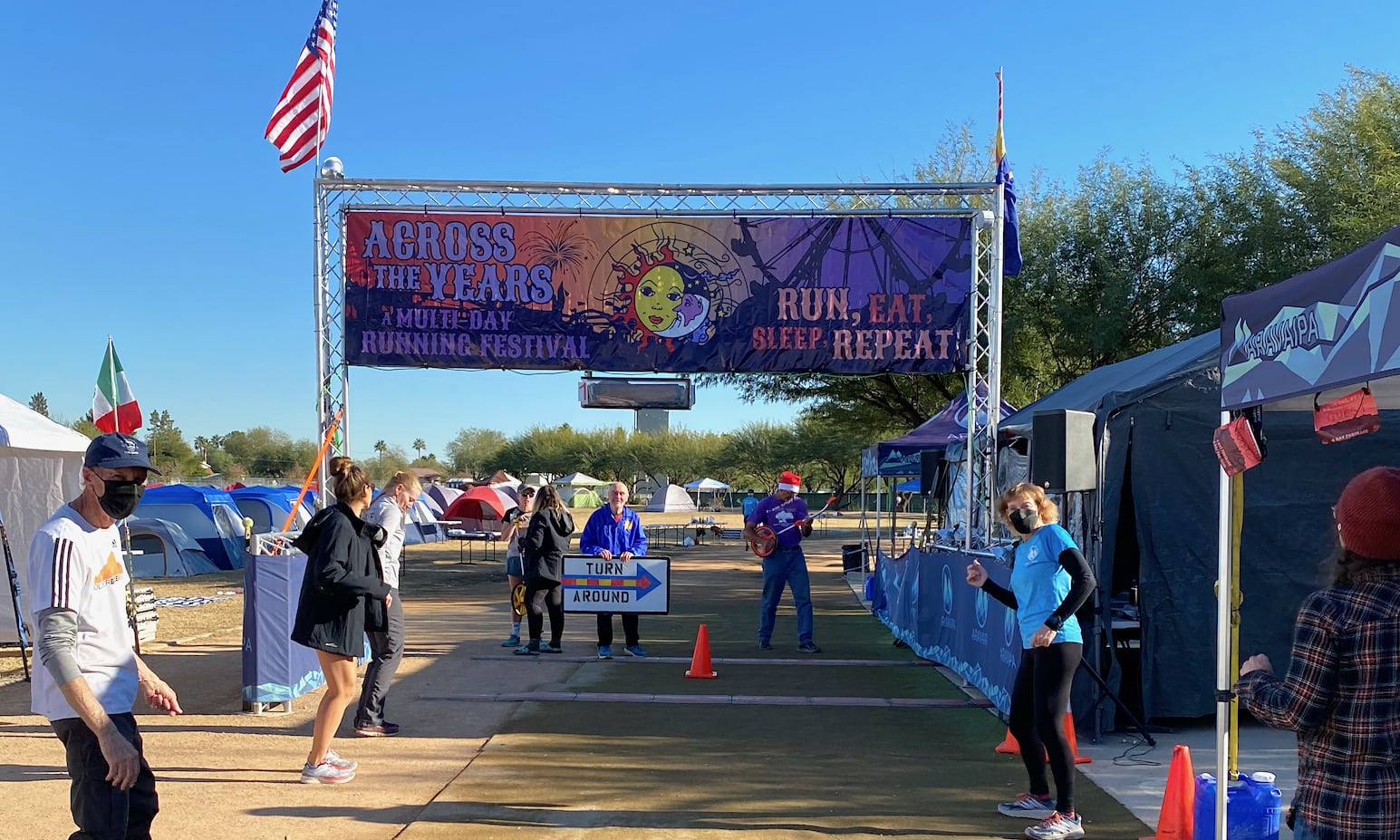 Turnaround time at Across the Years start finish line where the Aravaipa team are dancing.